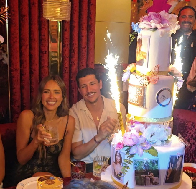 Jessica Alba and Danny Ramirez celebrating her birthday with a custom cake.