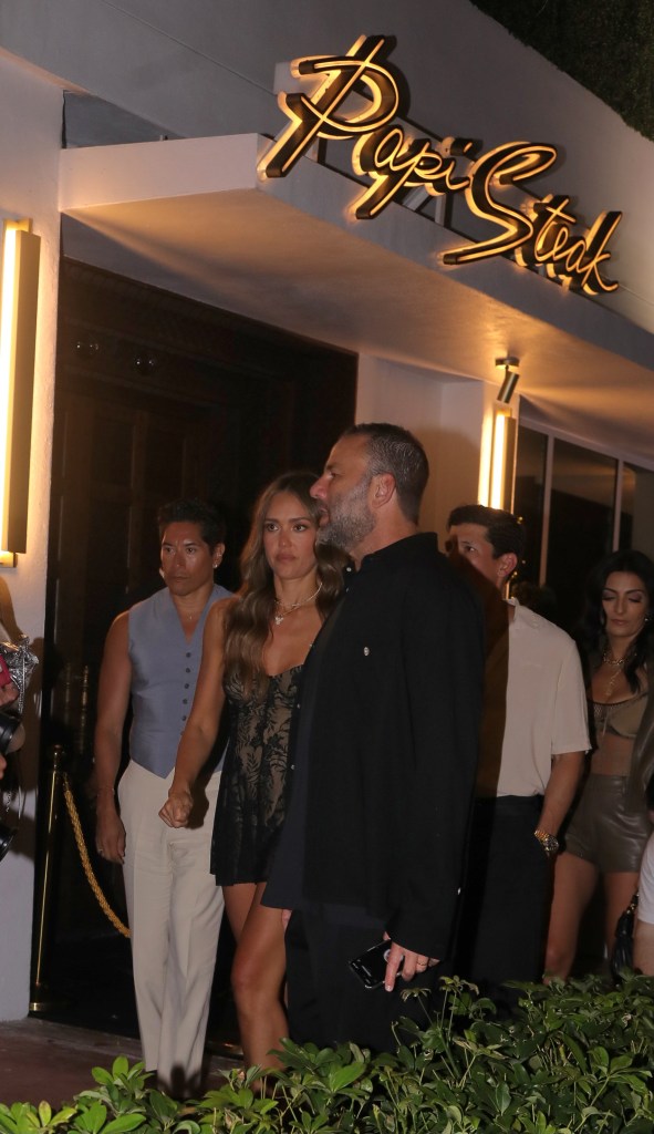 Jessica Alba, David Grutman, and Papi outside Papi Steak in Miami, departing for LIV Nightclub.