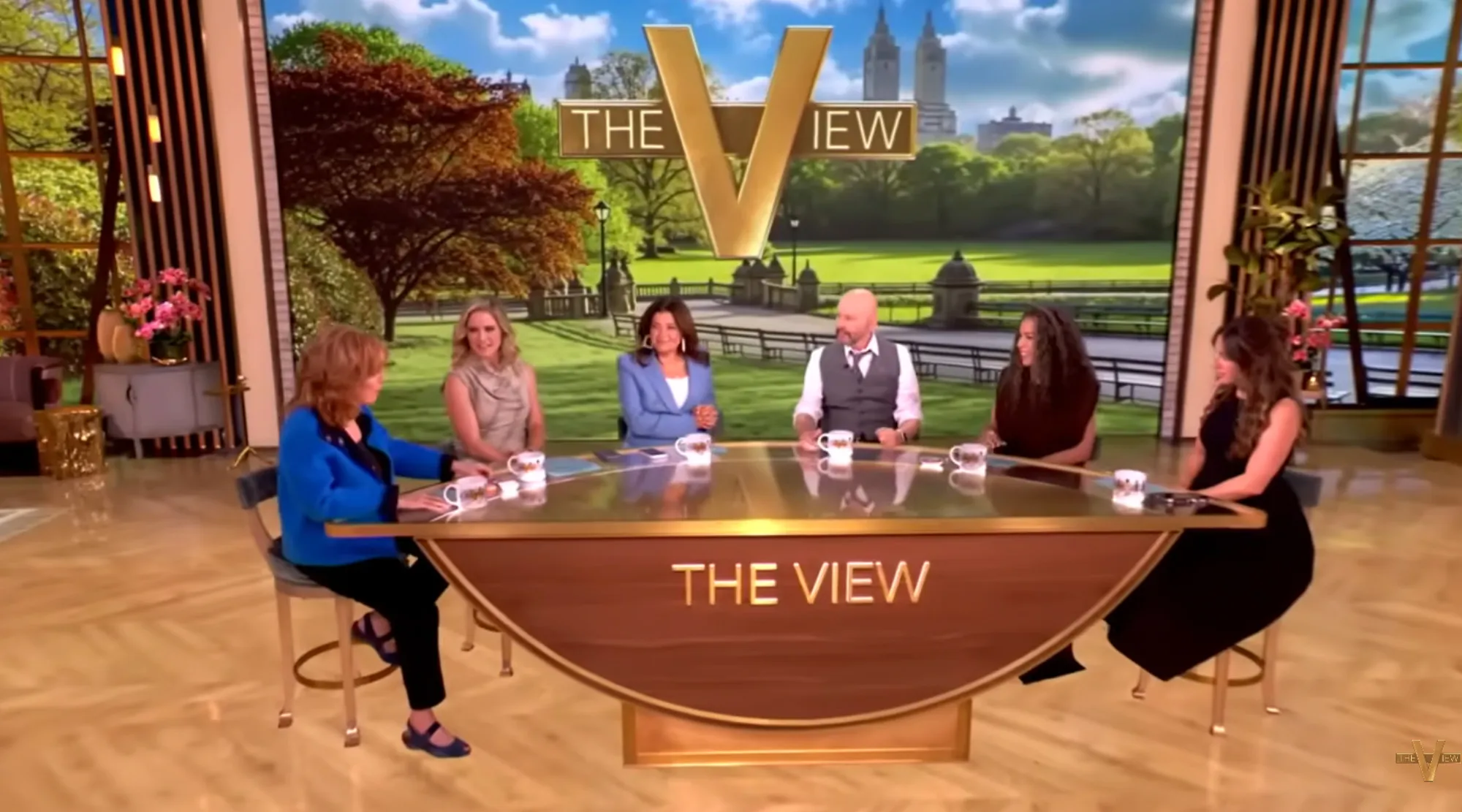 Jon Cryer on The View, with four female hosts, seated at a curved table with 