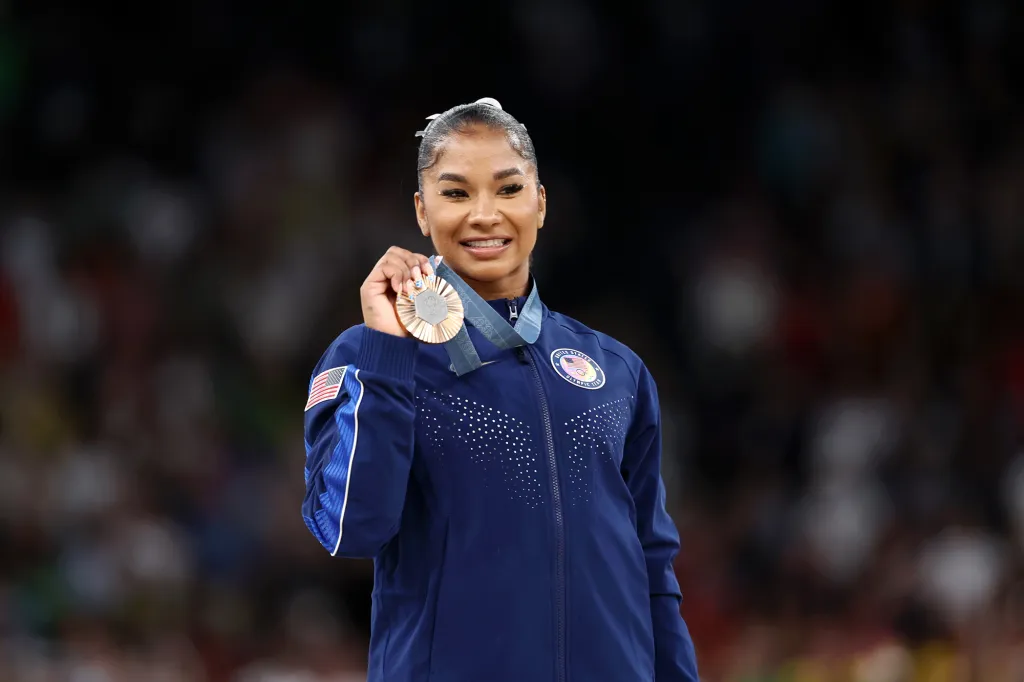 Jordan Chiles holding her bronze medal at the Paris 2024 Olympic Games.