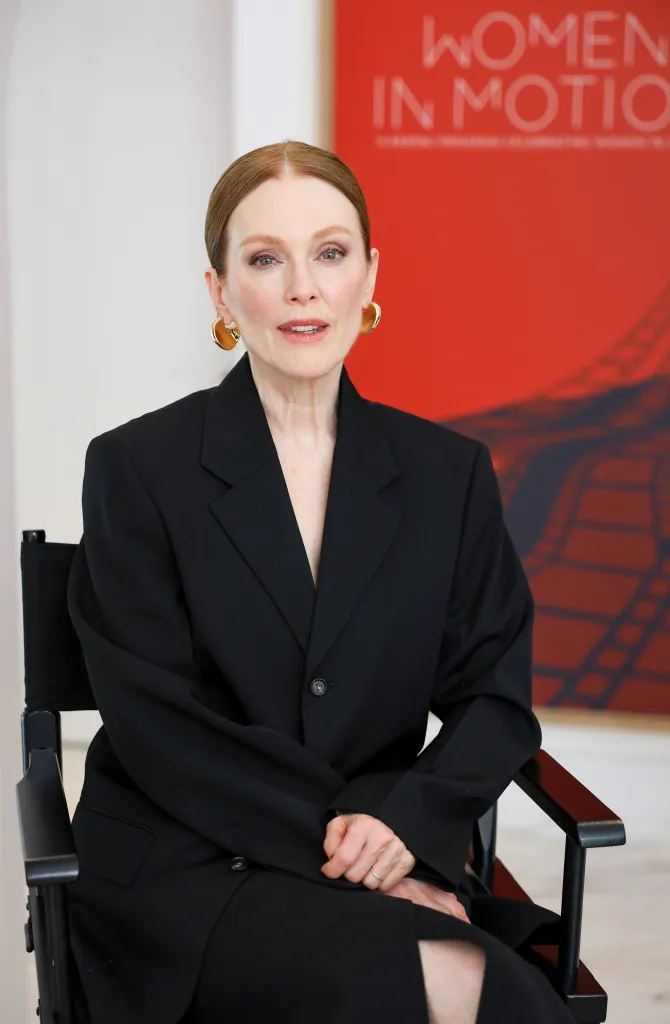 Julianne Moore sitting and facing forward at a 