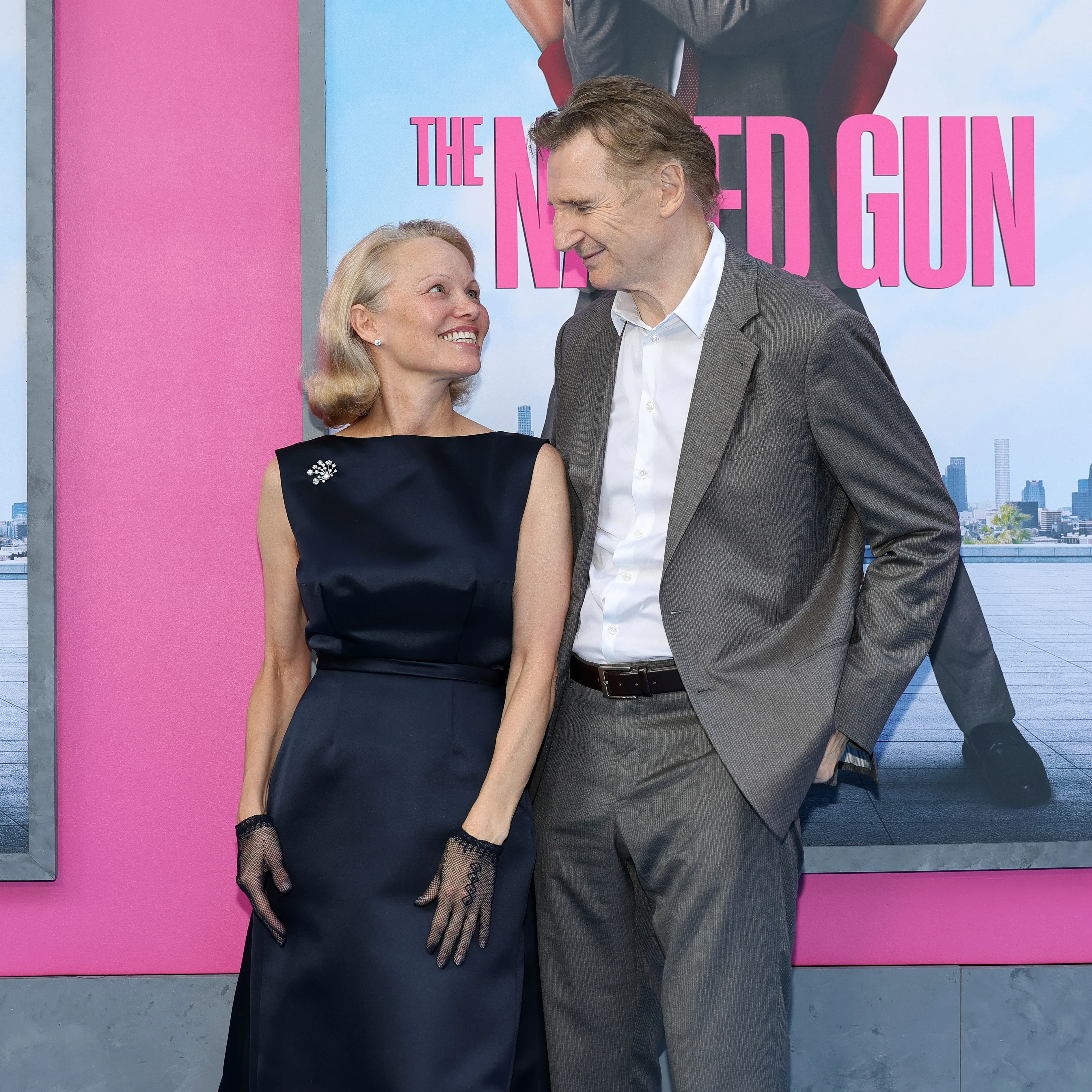 Pamela Anderson and Liam Neeson attend 