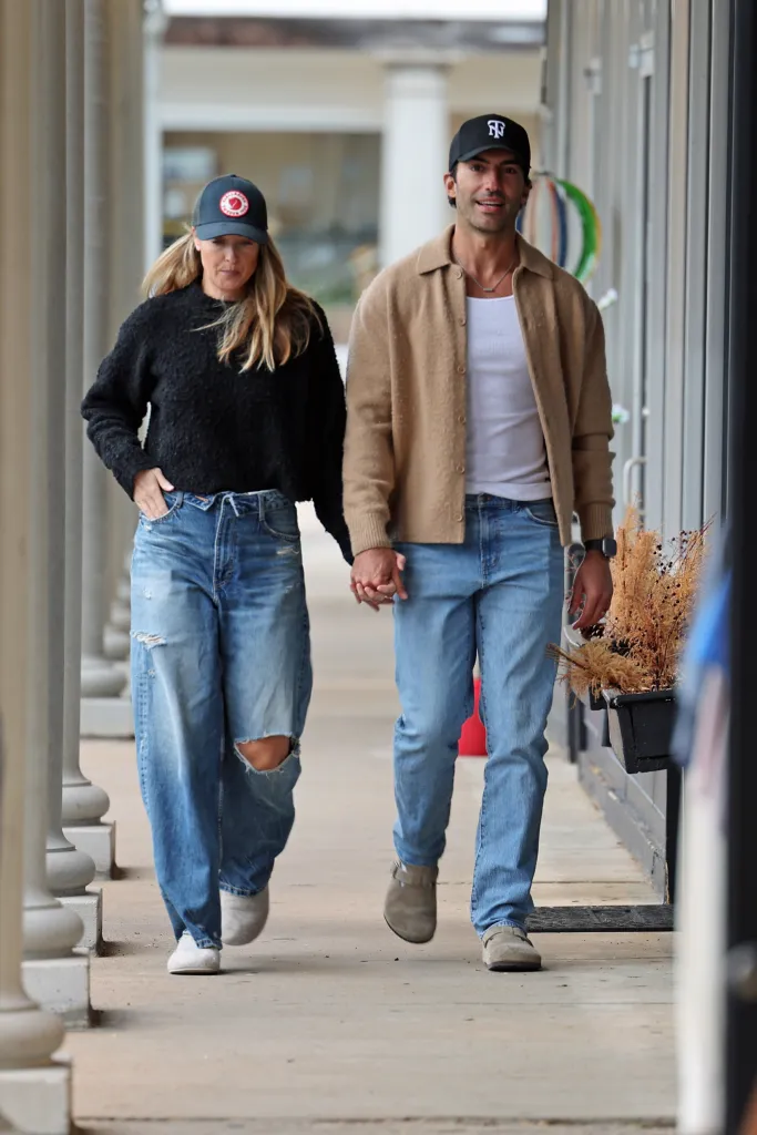 Justin Baldoni and his wife Emily spotted holding hands.