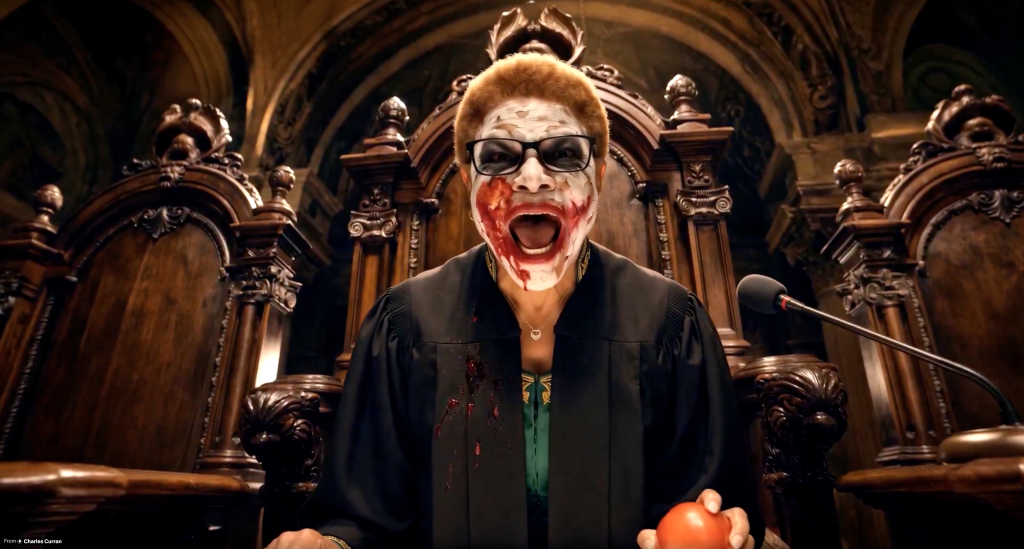 Illustration of Karen Bass as the Joker, wearing a judge's robe, with white face paint, a wide red smile, and black glasses, holding a red apple while seated in a wooden judicial bench.