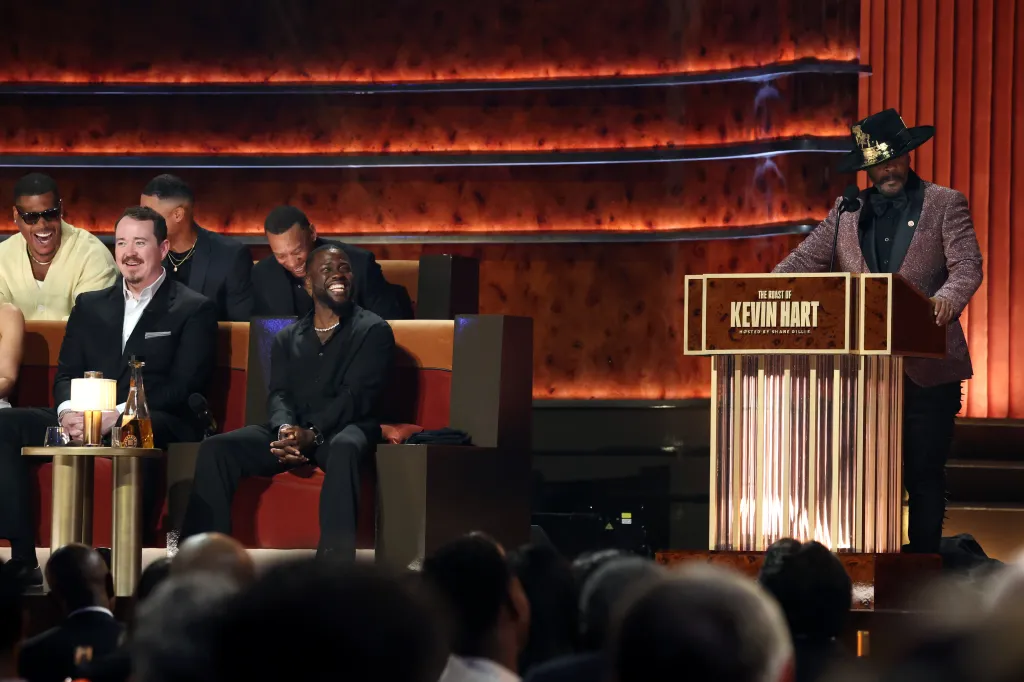 Katt Williams speaking at a podium during 
