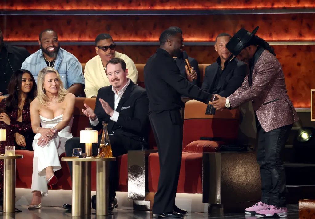 Kevin Hart and Katt Williams shake hands onstage at the Netflix Is A Joke Festival.