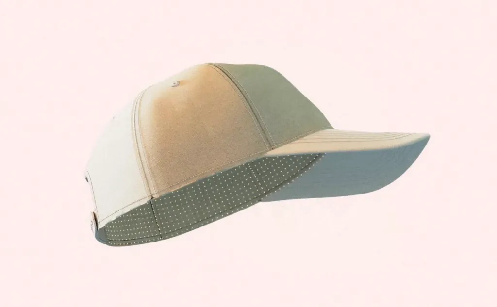 A baseball cap with a patterned underside on the brim.