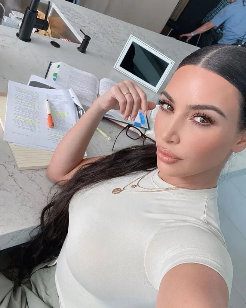 Kim Kardashian West taking a mirror selfie while studying for the bar exam.