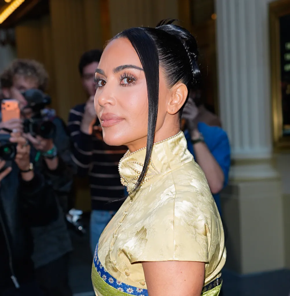 Kim Kardashian in a yellow embroidered dress with pearl details at 