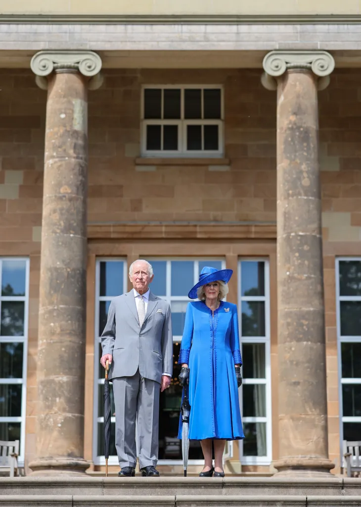 King Charles III and Queen Camilla on the steps of Hillsborough Castle.