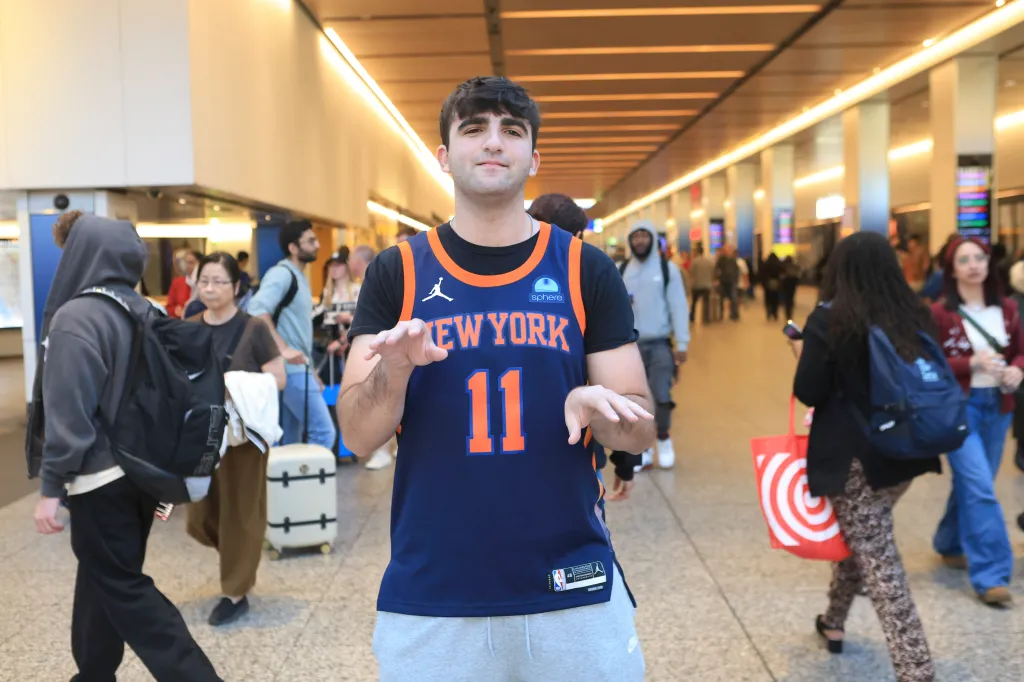 Knicks fan Alex Jenis at Penn Station in Manhattan.
