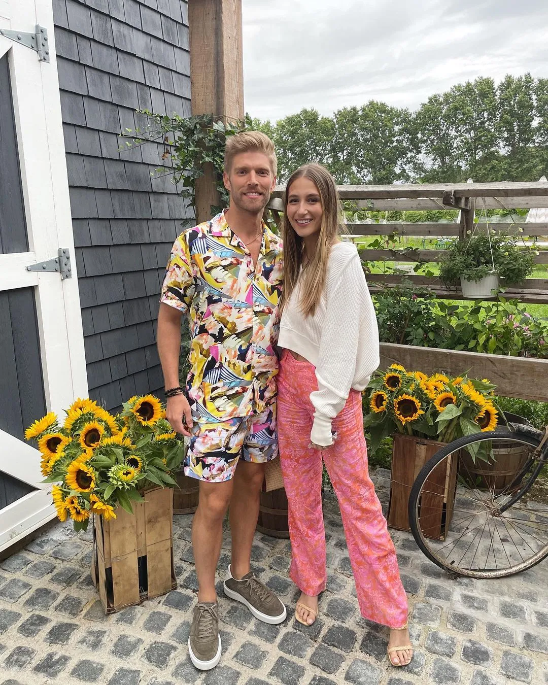 Kyle Cooke and Amanda Batula pose together.
