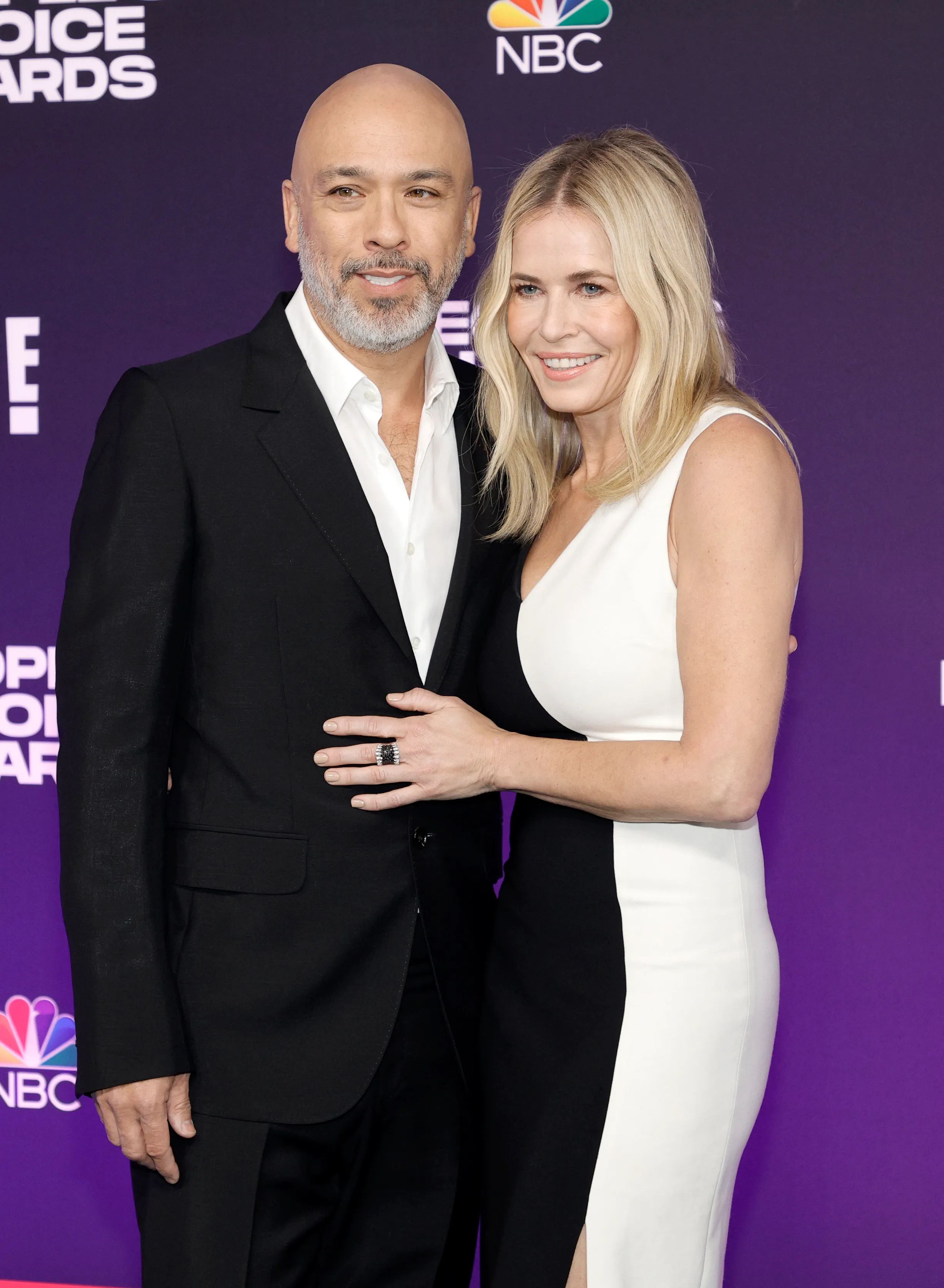 Jo Koy and Chelsea Handler pose together on the red carpet.