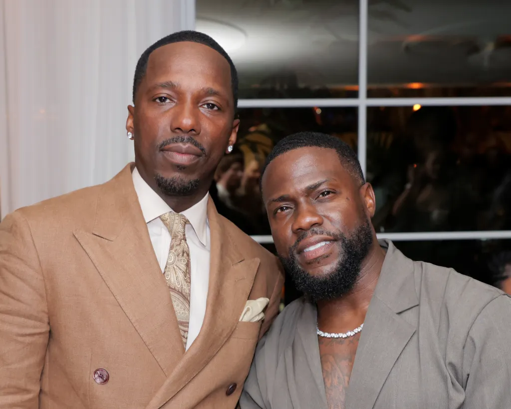 Rich Paul and Kevin Hart smiling at the Sports Illustrated's Race Weekend Kickoff event.