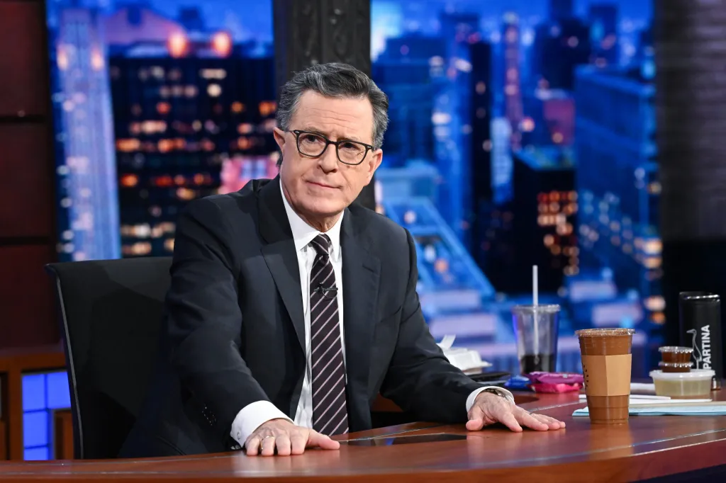 Stephen Colbert at his desk during 