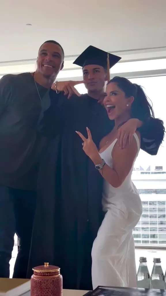 Lauren Sanchez and Tony Gonzalez celebrating with their son Nikko in his graduation cap and gown.