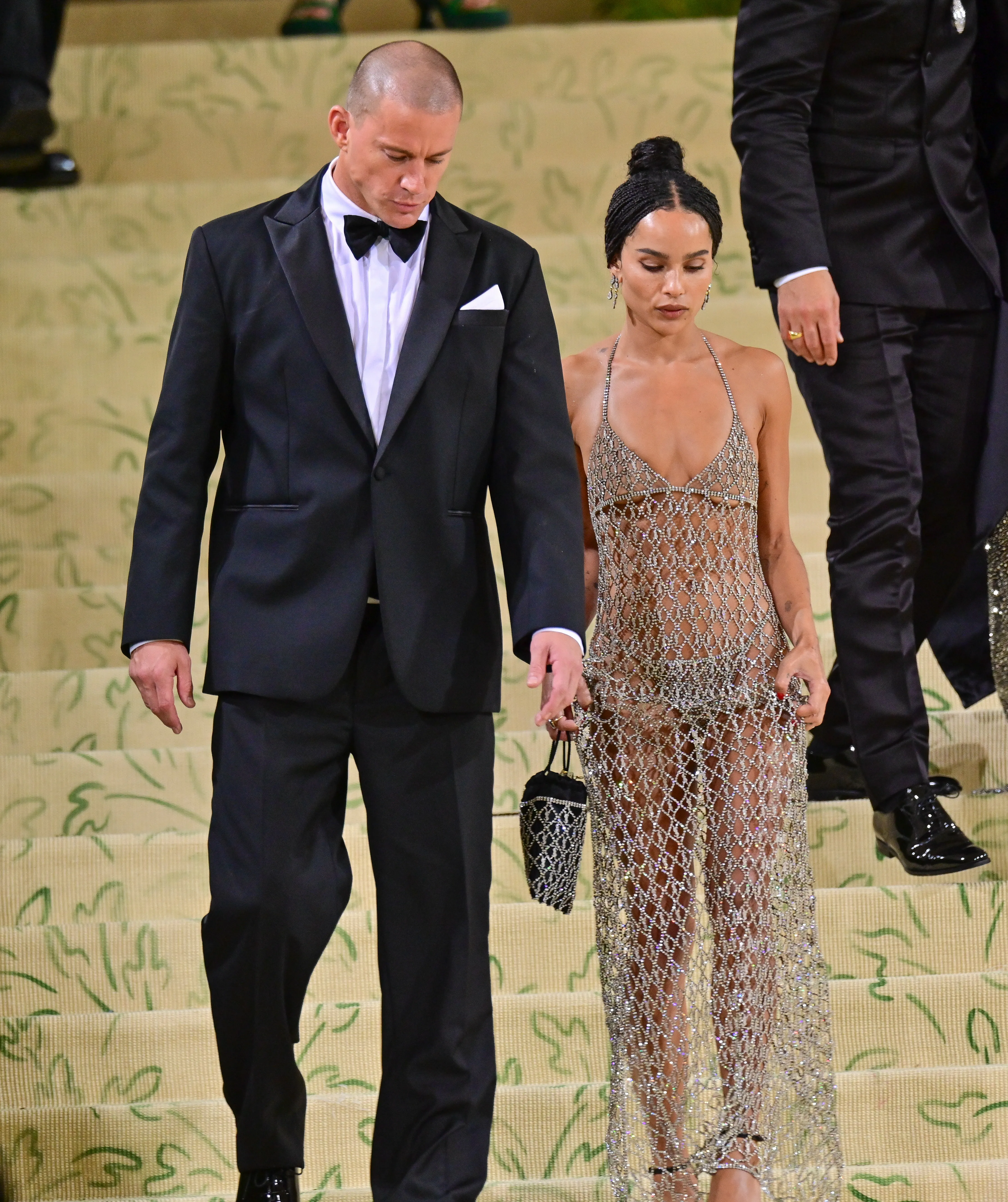 Channing Tatum and Zoe Kravitz walking down steps after the 2021 Met Gala.