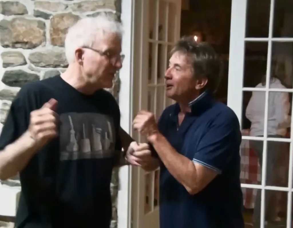 Steve Martin and Martin Short talking to each other.