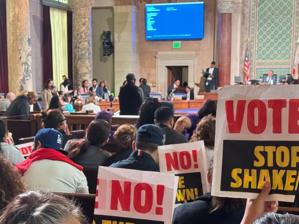 People protesting a minimum wage hike at Los Angeles City Hall.
