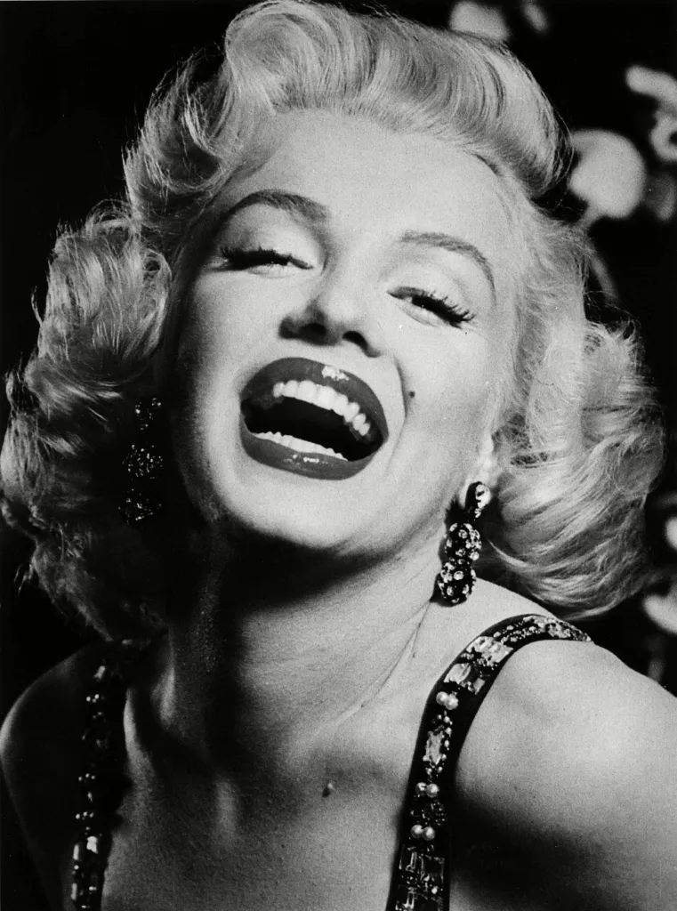Marilyn Monroe laughing.