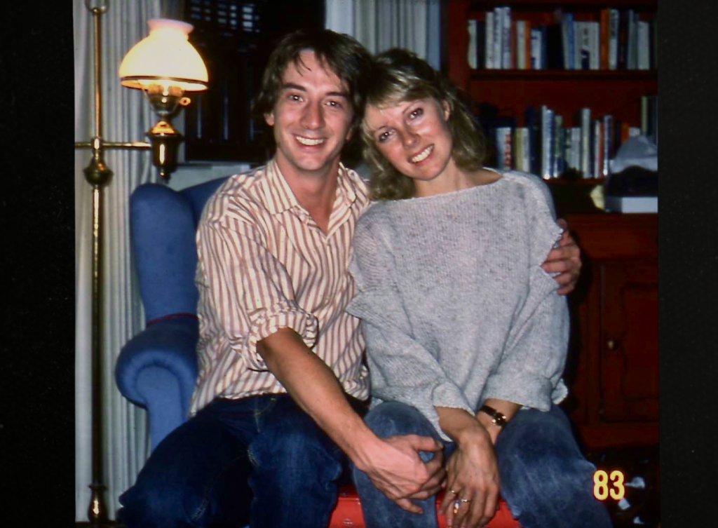 Martin Short and Nancy Dolman smiling while embracing.