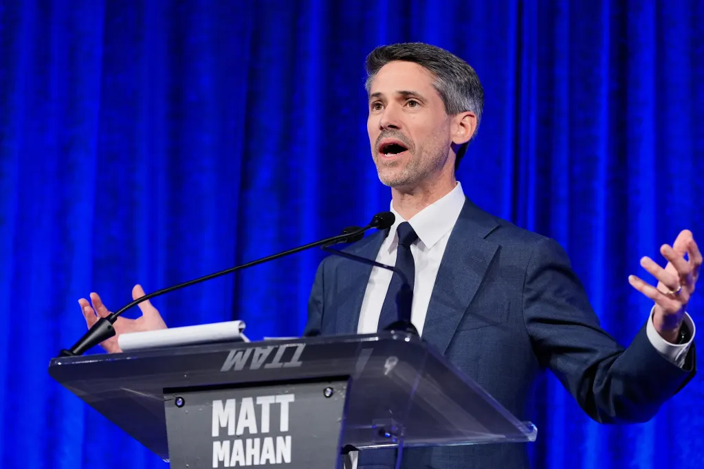 Matt Mahan speaking at a debate.