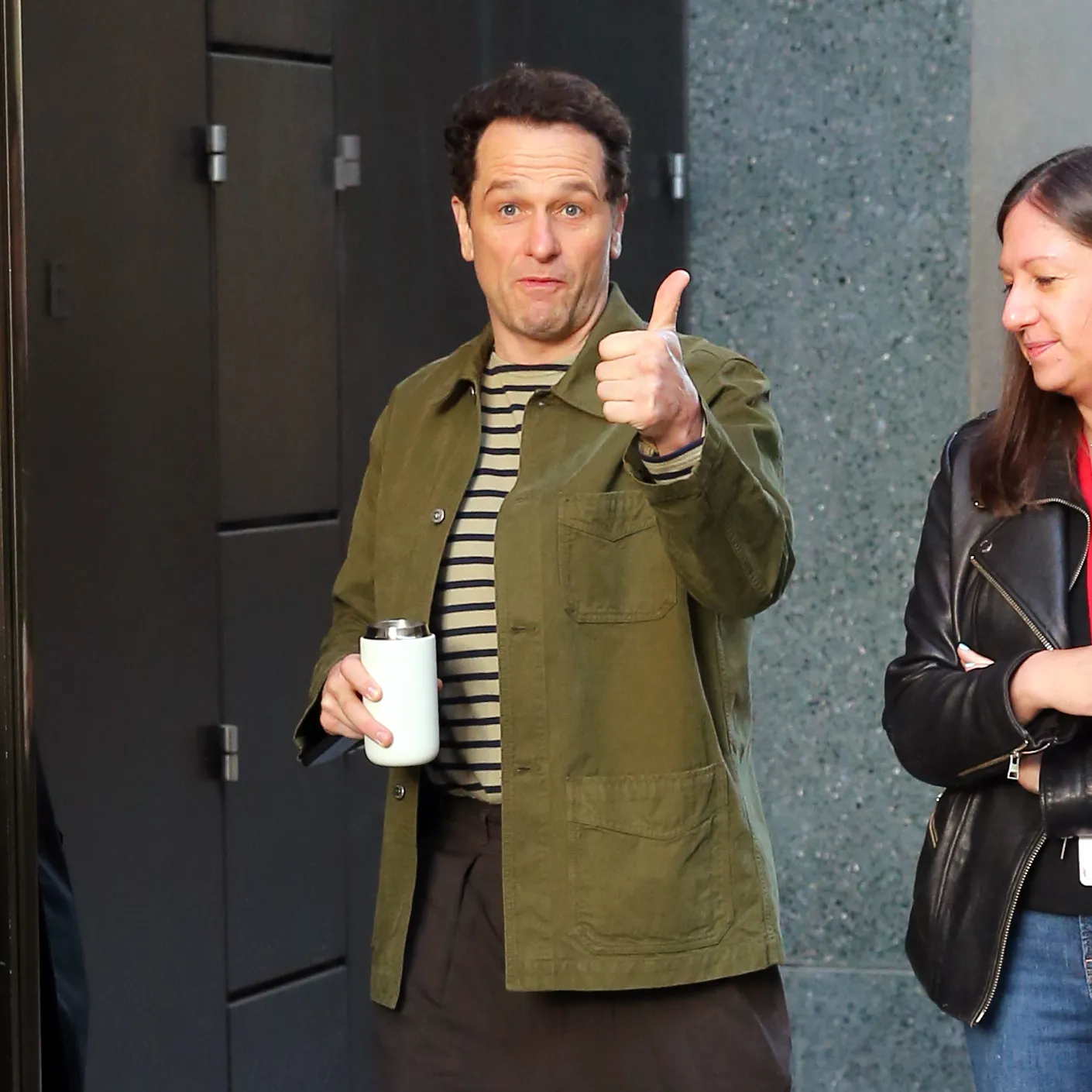 Matthew Rhys gives thumbs up as he arrives at GMA in New York City