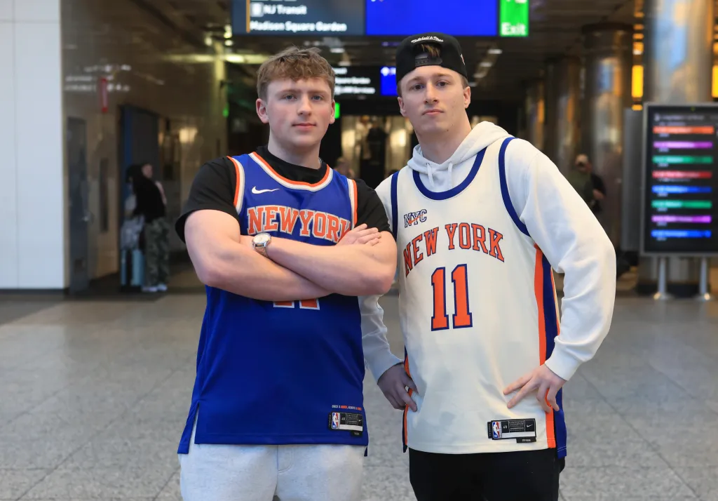 Knicks fans Matthew Bruen and Max Modica at Penn Station.