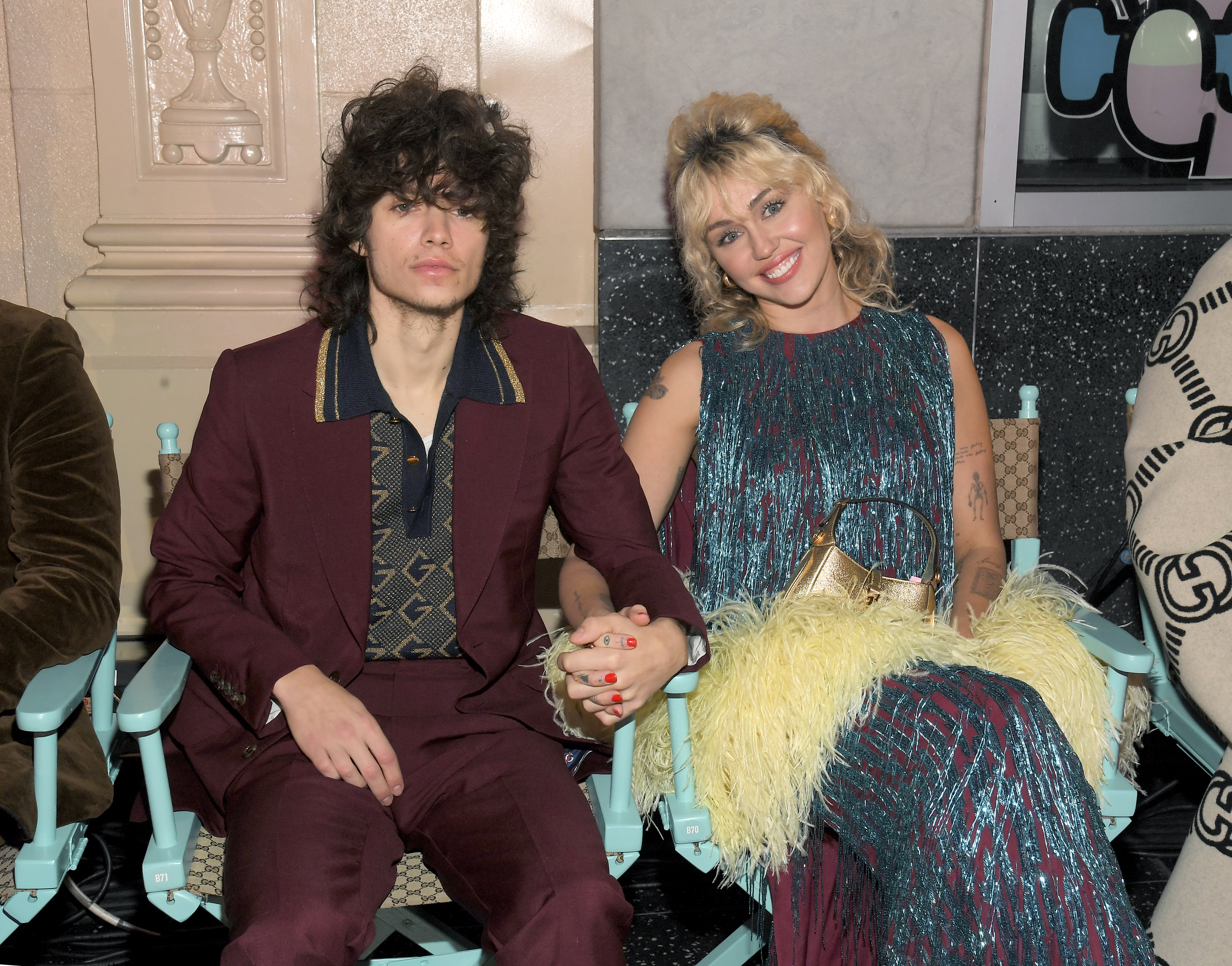 Miley Cyrus and Maxx Morando holding hands at the Gucci Love Parade.