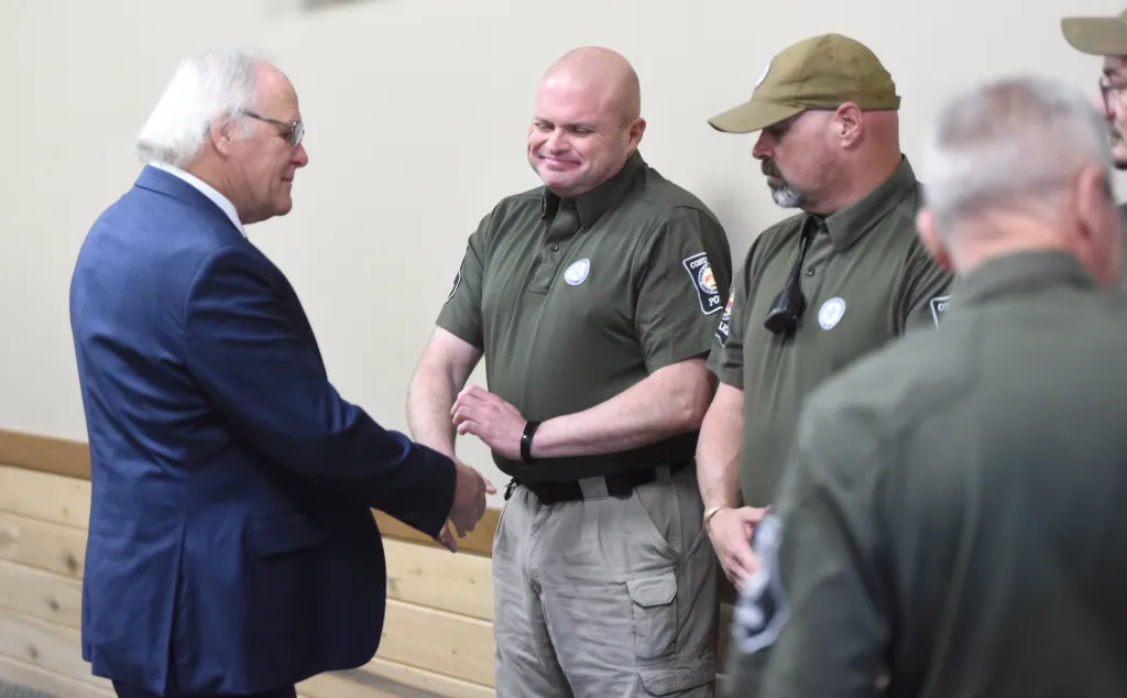 Cohutta Mayor Ron Shinnick shakes hands with members of the Cohutta Police Department on April 30, 2026.