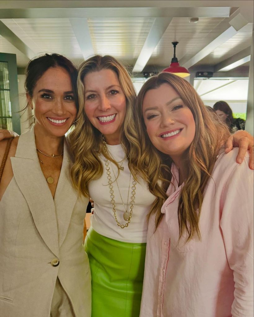 Meghan Markle, in a beige vest, Amy Griffin, in a white tank top and green skirt, Jamie Kern Lima, in a pink jacket.