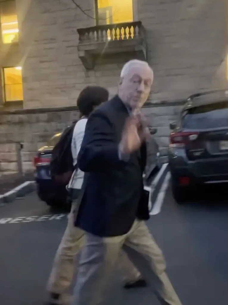 Michael Kotlikoff seen interacting with a student.