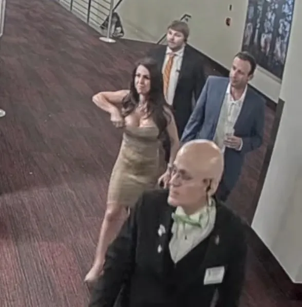 Lauren Boebert being escorted out of a Denver theater.