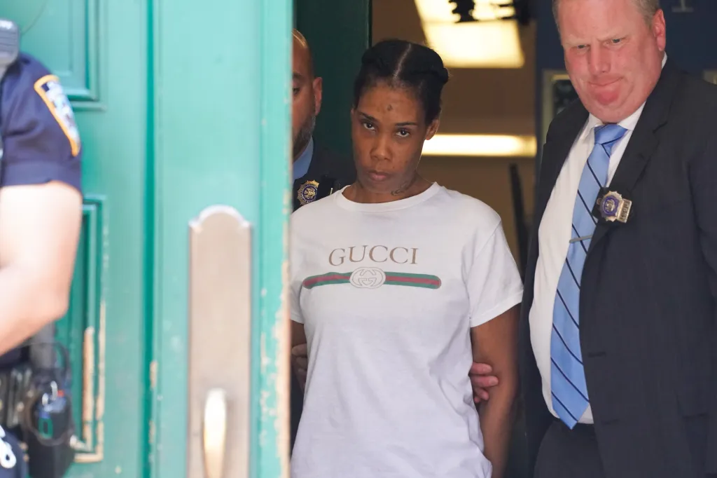 Navasia Jones, wearing a white 