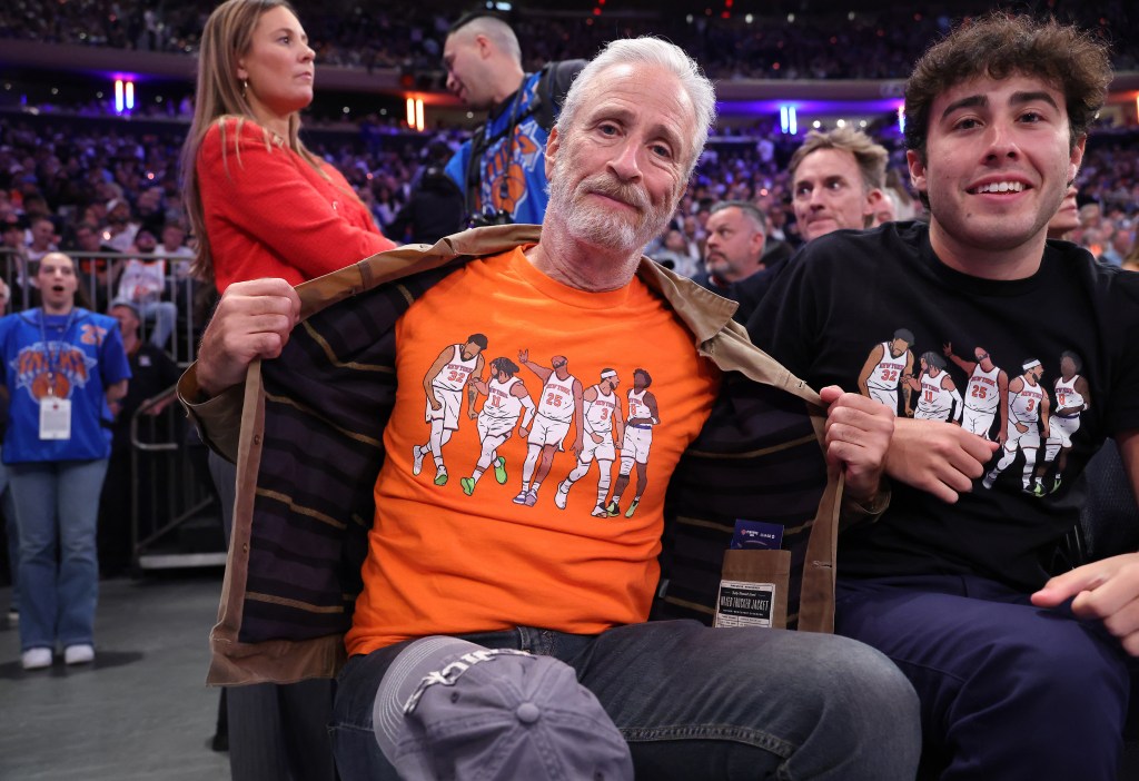 Comedian Jon Stewart shows off his Knicks tee in the 2nd quarter of the NBA Eastern Conference Finals Game 2.