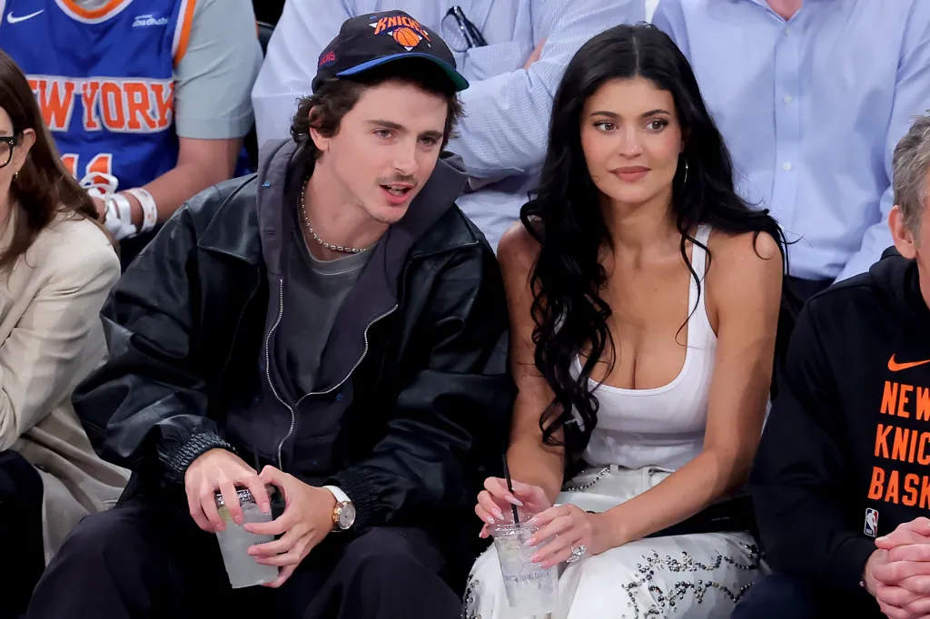 Timothée Chalamet and Kylie Jenner watching an NBA game.
