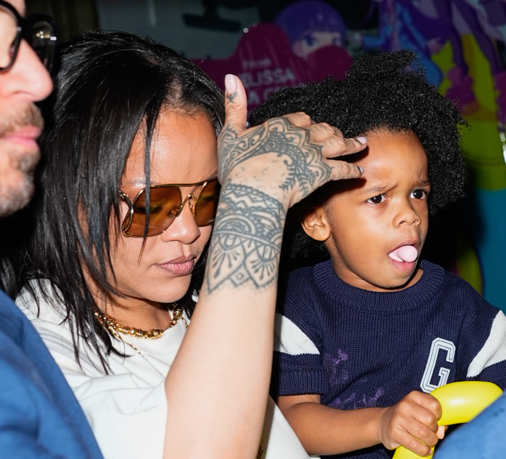 Rihanna with her son RZA at his 4th birthday party.