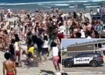 Three stabbed as hundreds take over Rhode Island beaches