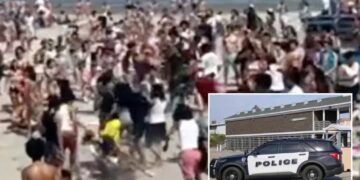 Three stabbed as hundreds take over Rhode Island beaches