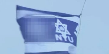 Swastika flag raised above NYU building named after billionaire Jewish causes donor during graduation week