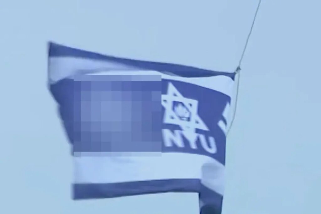 Swastika flag raised above NYU building named after billionaire Jewish causes donor during graduation week