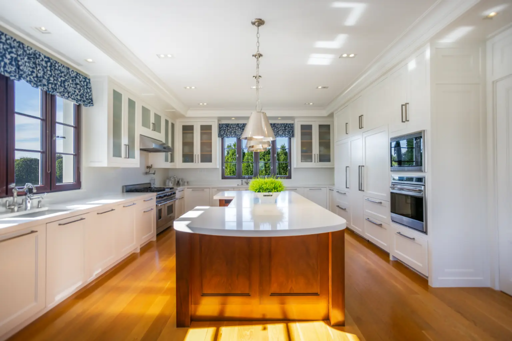The property comes loaded with amenities including a 14-seat movie theater, a two-lane bowling alley, a 750-gallon shark tank, an indoor pool, a spa and a pool house surrounded by a moat.