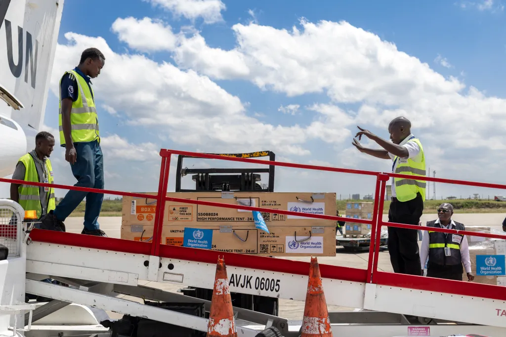 Ground crew load medical supplies onto a United Nations Humanitarian Air Service (UNHAS) operated charter plane bound for Bunia in the Democratic Republic of Congo as the World Health Organization (WHO) coordinates delivery as part of the response to an Ebola outbreak, at Jomo Kenyatta International Airport in Nairobi on May 20, 2026.