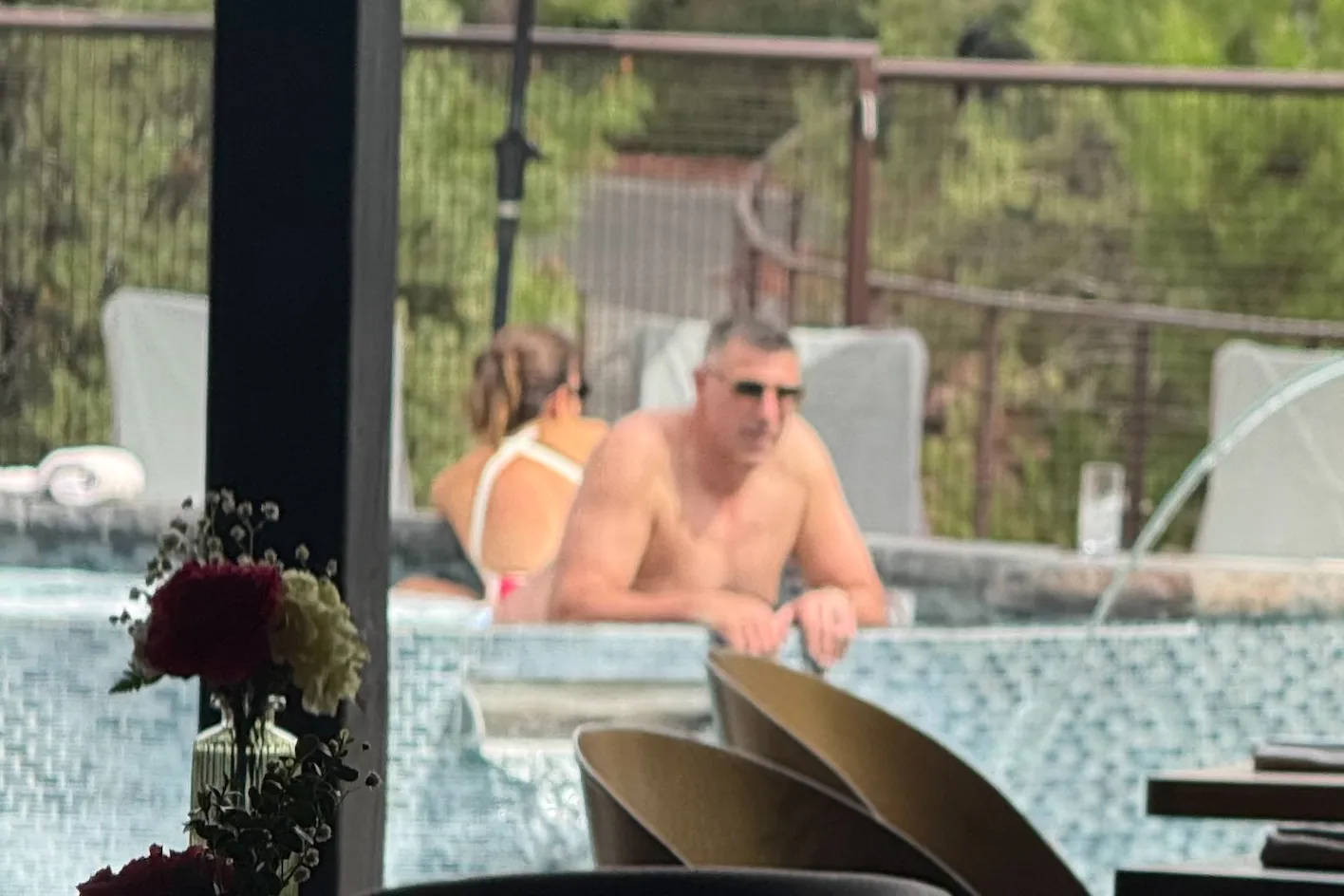 Patriots coach Mike Vrabel and reporter Dianna Russini in a hot tub.