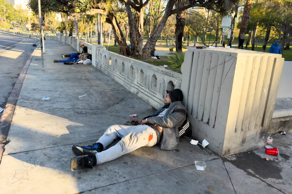 People resting in MacArthur Park in Los Angeles.