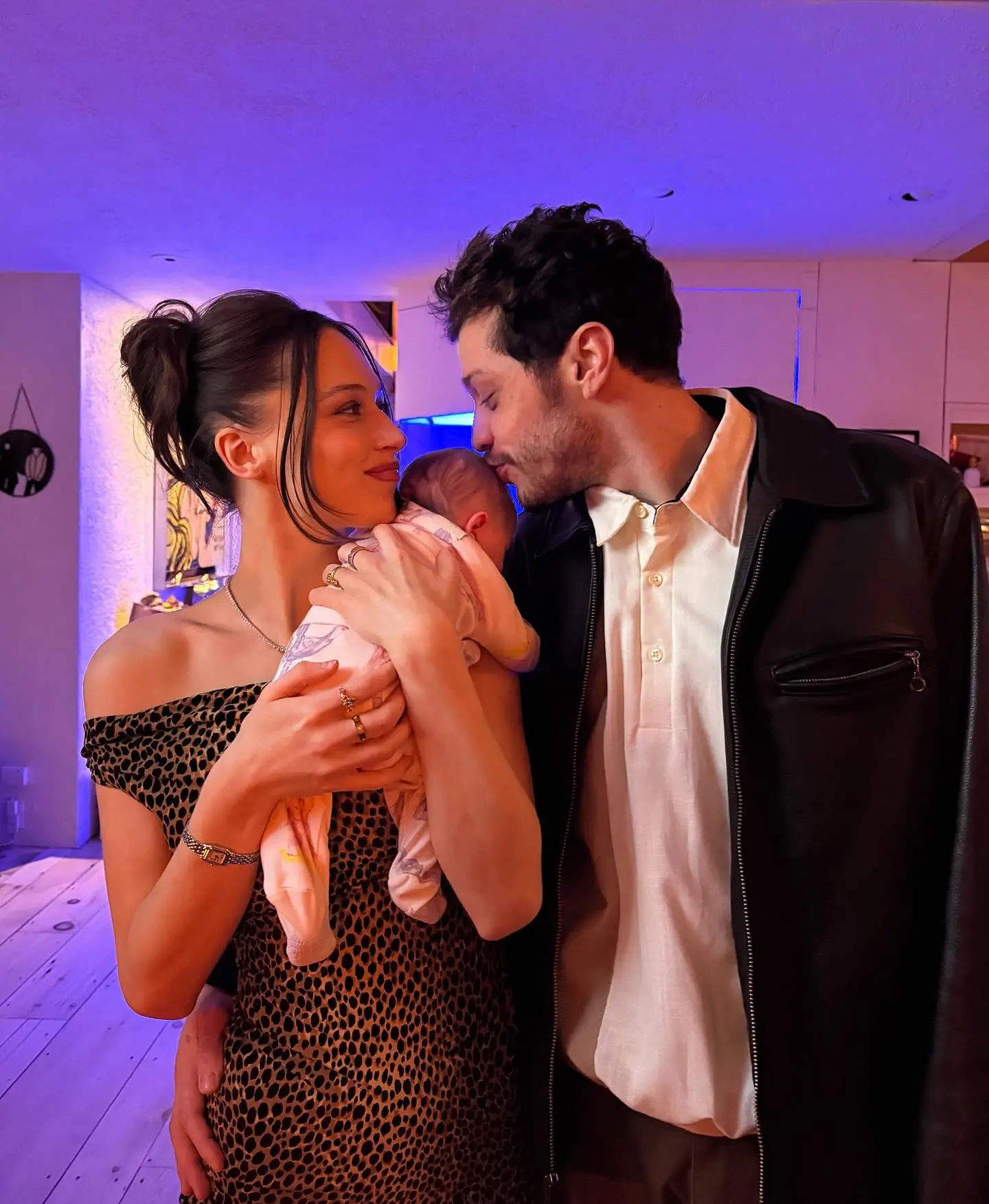 Pete Davidson, Elsie Hewitt, and their baby Scottie pose together.