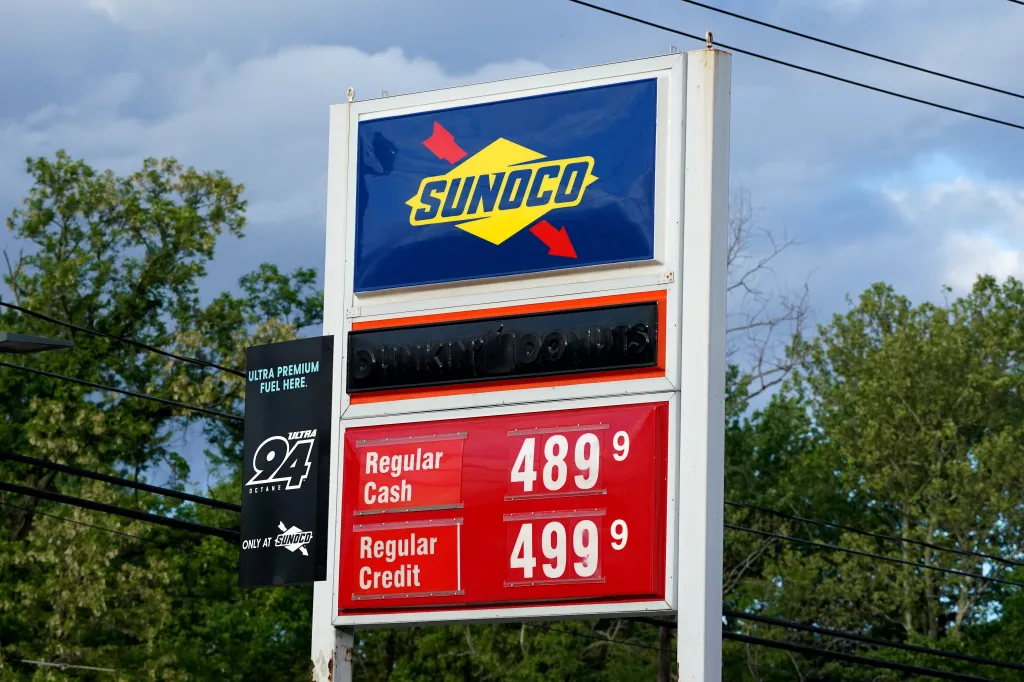 Sunoco gas station sign showing regular gas prices of $4.89 for cash and $4.99 for credit.