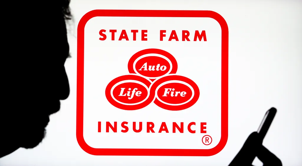 Photo illustration of the State Farm Insurance logo displayed on a monitor.