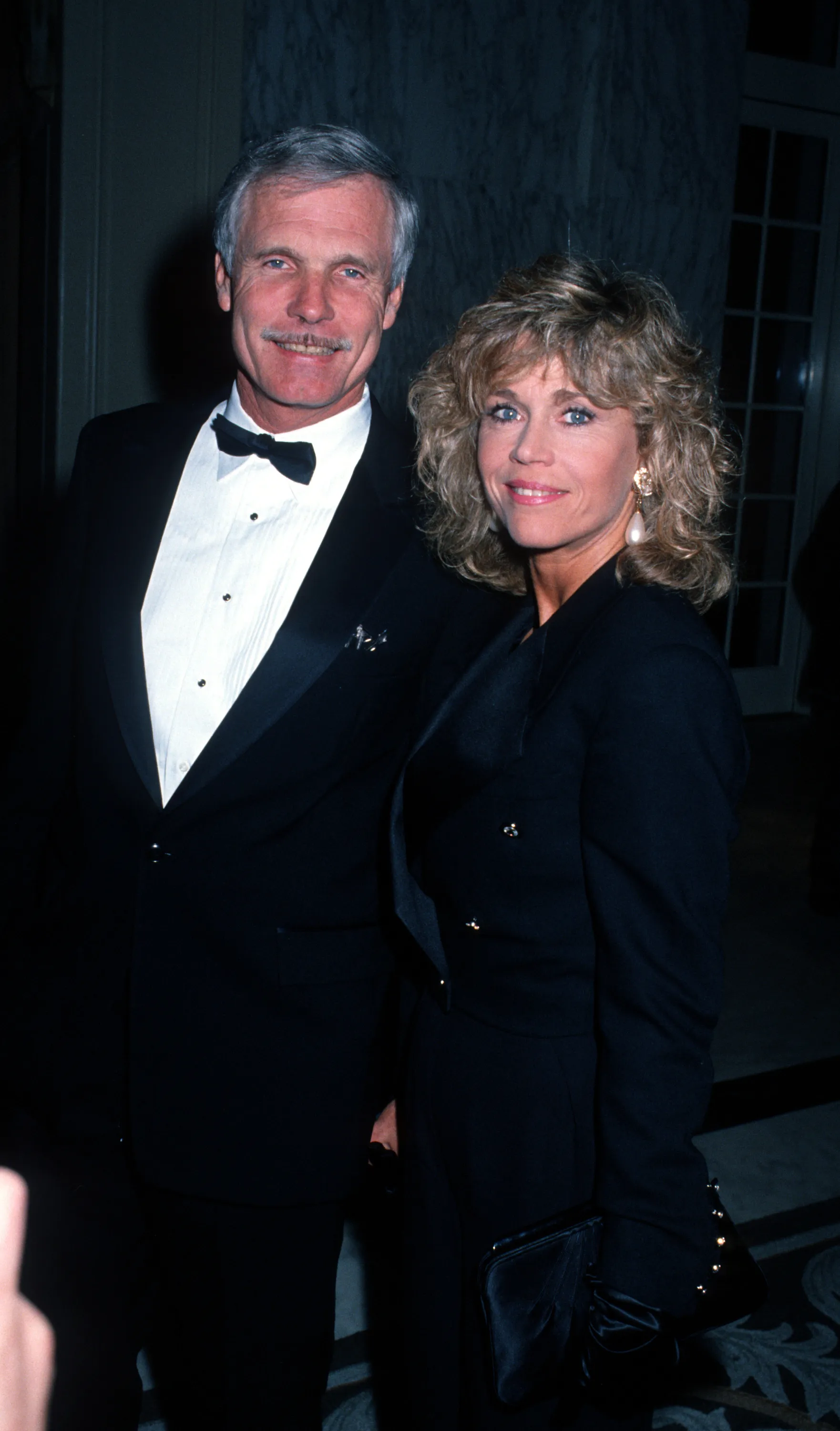 Ted Turner and Jane Fonda pose together.