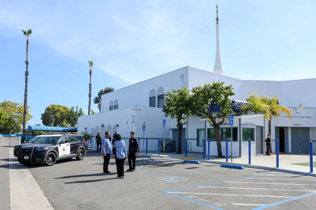The Islamic Mosque in San Diego, with a police car and officers outside.